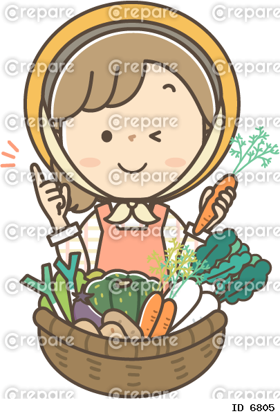 収穫した野菜と笑顔の女性