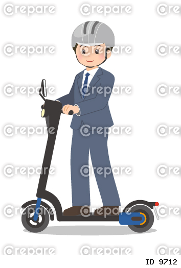 ヘルメットを着用して電動キックボードに乗るスーツの男性