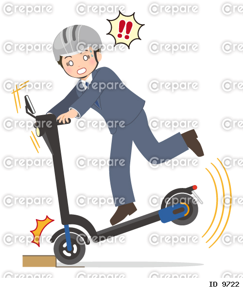 電動キックボードが段差にぶつかって動転するヘルメットの男性